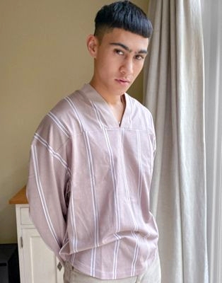 Бежевая плотная oversized-футболка в рубчик