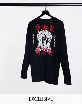 Oversized-футболка с широким рукавом 3/4 и вставками в ацтекском стиле