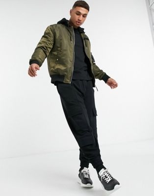 Удлиненная трикотажная куртка зеленого цвета в стиле oversized на кнопках